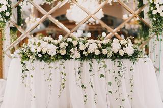 elegant newlyweds table, flower decoration, white pastels